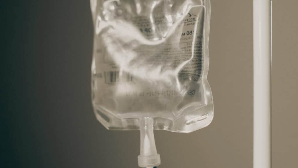 IV saline bag hanging on a pole — hydration and wellness IV therapy at Good Chemistry Med Spa in Cumming, GA