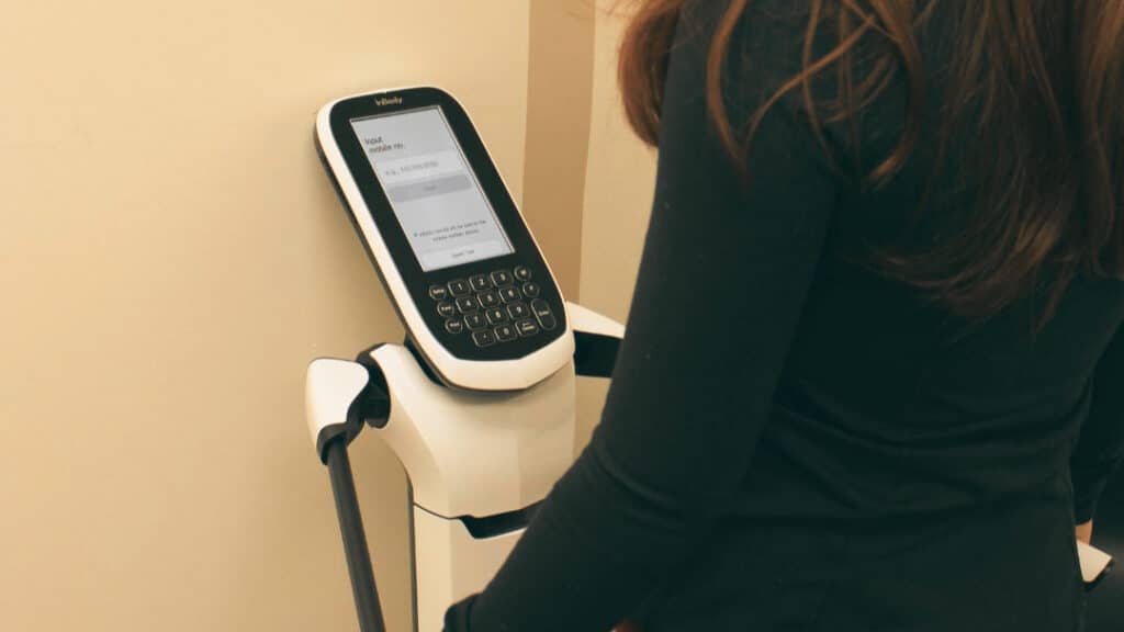 Patient receiving an InBody body composition scan during a medical weight loss program in Cumming, GA at Good Chemistry