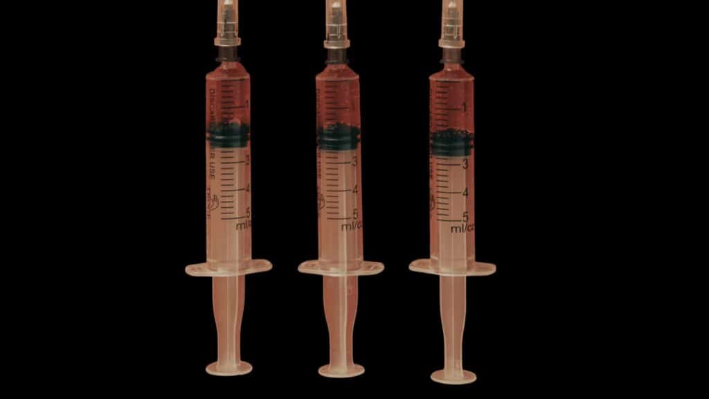 Three syringes filled with red liquid for methylated B12 injections in Cumming GA Good Chemistry Health & Med Spa