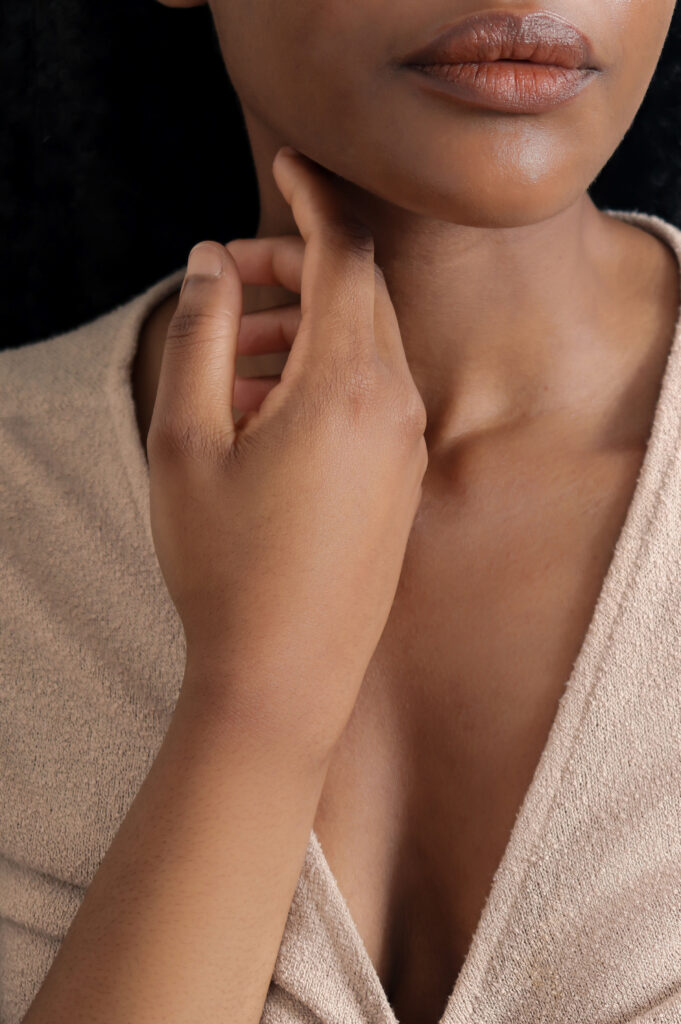 woman achieving supple skin, enhanced libido, and overall wellbeing due to hormone optimization in cumming ga