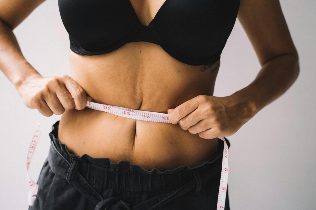 Woman Measuring Waist Semaglutide Weight Loss Cumming GA Good Chemistry